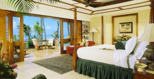komfortables schlafzimmer im one & only le saint geran luxus resort auf mauritius